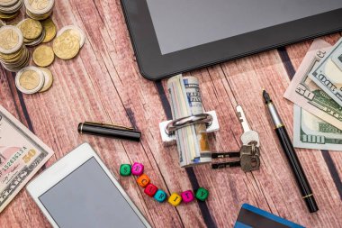 kilit, Doları banknot, sikke, tablet ve telefon Danışma.