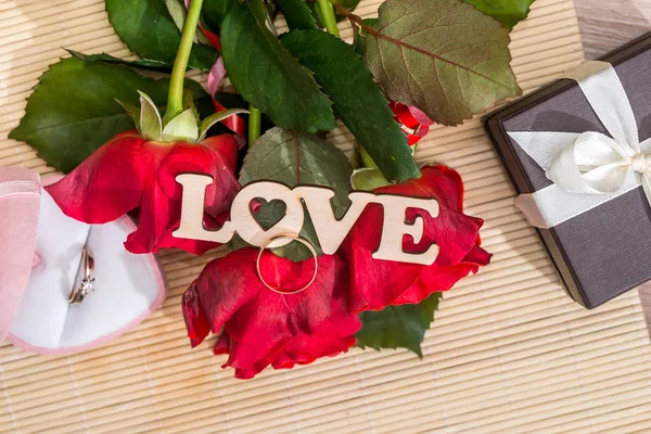 Wedding Concept Text Love Wedding Rings Gift Box Red Roses — Stock Photo, Image