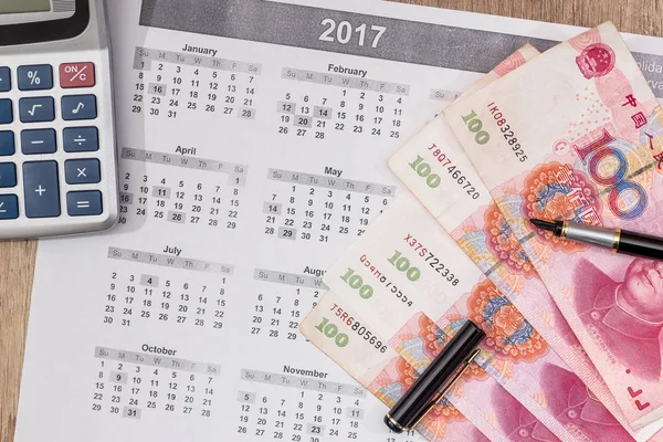 calendar event with chinese yuan, close up.