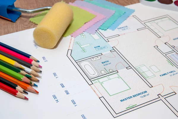 architectural plan of the house with color palette, pencil and fabric samples