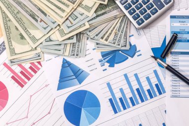 para, hesap makinesi ve kalem grafiği