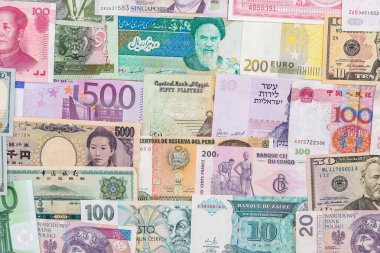arka plan olarak dünya ülkeden birçok farklı para birimi banknotlar