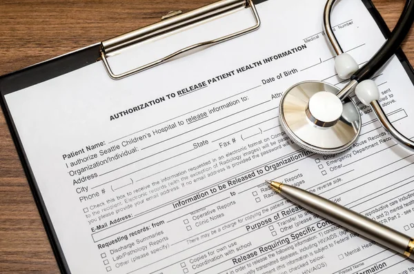 patient information blank with pen and stethoscope