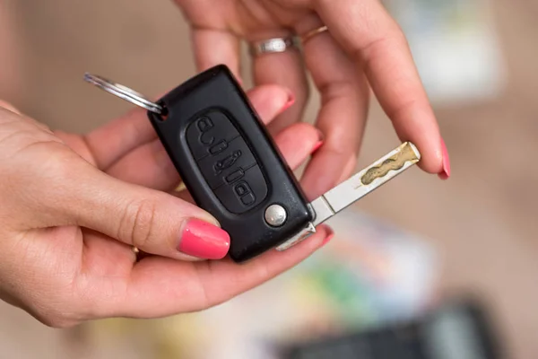 car key in woman hand