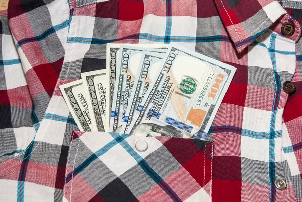 hundred dollars money into the shirt pocket. Cash