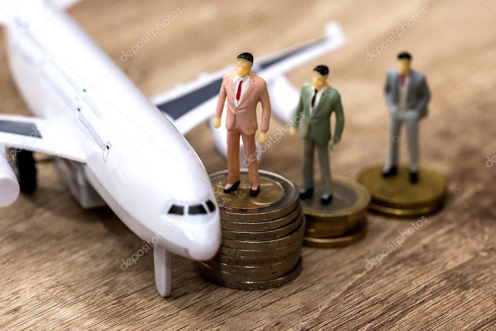 airplane money and mini toys people