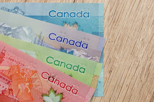 canadian dollar bills on table close up