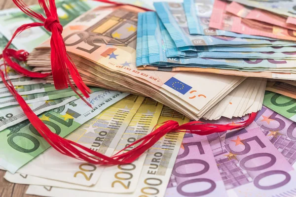 Large Pile Euro Money Red Ribbon — Stock Photo, Image