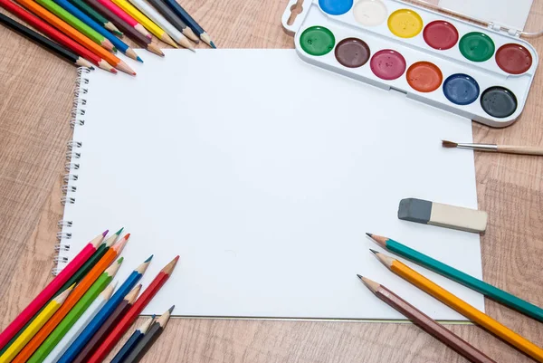 Set Colorful Paints Crayons Brushes Blank Album — Stock Photo, Image