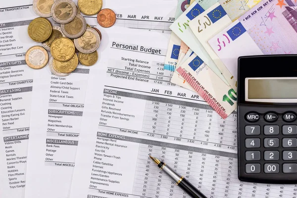 Family Budget - document costs, Euro Money, pen and calculator.