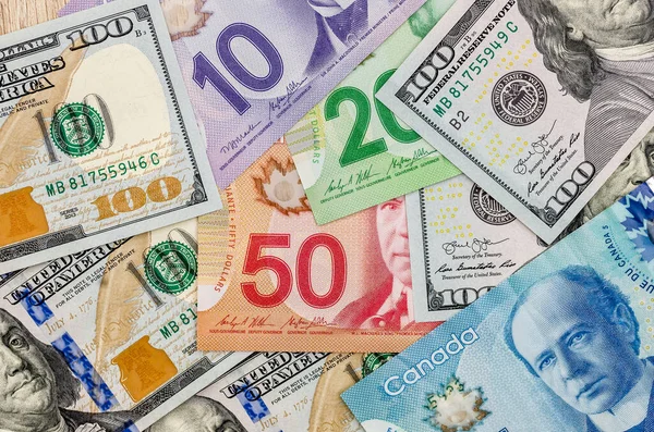 Kanadischer Und Amerikanischer Dollar Als Hintergrund — Stockfoto