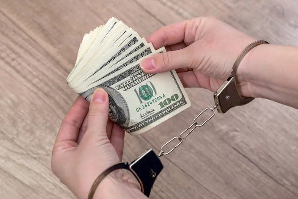 Female Hands Handcuffs Dollars Table — Stock Photo, Image