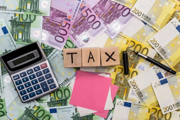 Tax Wooden Cubes Euro Bills Calculator — Stock Photo, Image