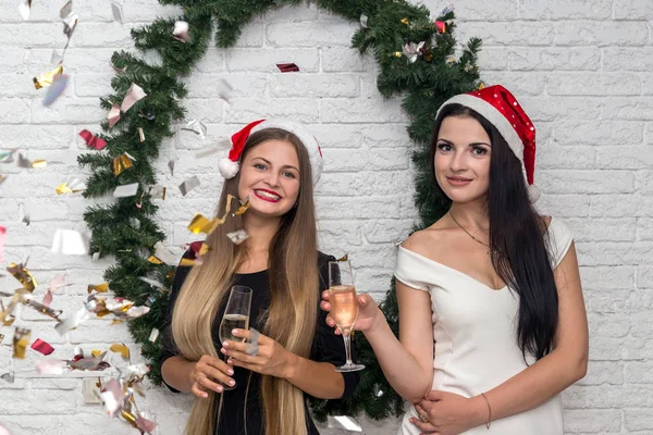 Beautiful Ladies Champagne Santa Hats — 스톡 사진