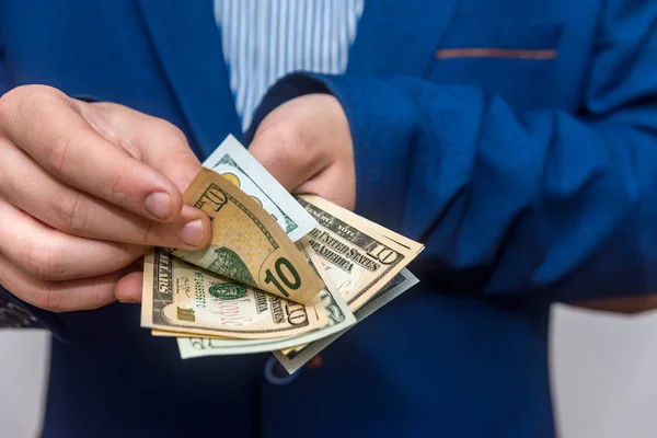 stock image Male hands counting dollar banknotes close up