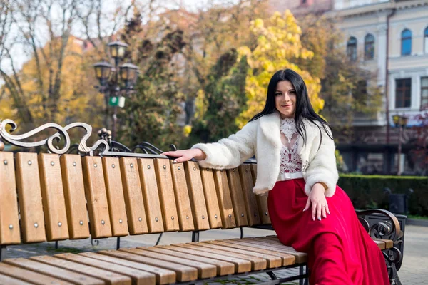 Attractive Brunette Woman Red Dress Sitting Bench Autumn Park — 스톡 사진