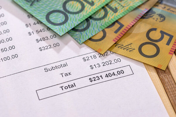 Purchasing order with australian dollar banknotes closeup