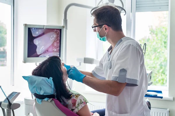 Patient and doctor in dentistry, planned visit