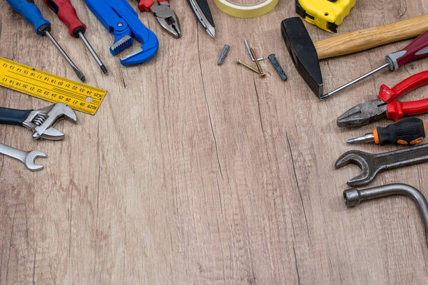 DIY tools on table shot in studio. top view.
