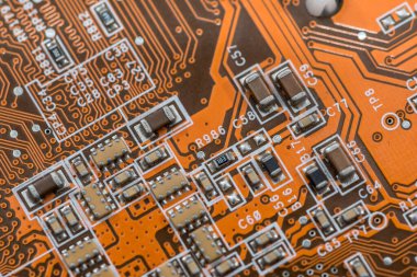 Arka plan turuncu olarak elektronik elektronik devre.