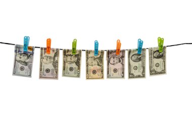 set of us dollars from 1 to 100 are drying on cord isolated on white background