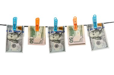 us dollars are drying on cord isolated on white background