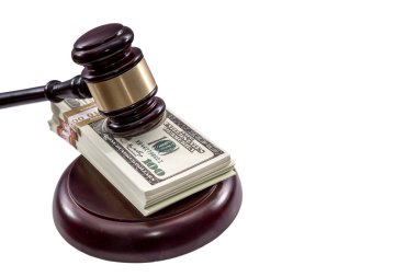 Wooden Hammer with dollars isolated on white background.