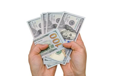 Bir avuç dolusu parayı tutan eller. Yeni 100 dolar izole edilmiş.