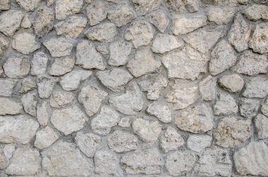 Arkaplan olarak taş duvar