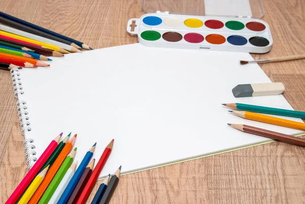 Set Colorful Paints Crayons Brushes Blank Album — Stock Photo, Image