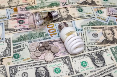 Dolar arka planında floresan ampul