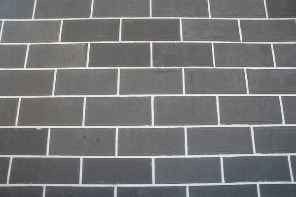 Pozioma Część Ściany Cegły Malowanej Czarno — Zdjęcie stockowe