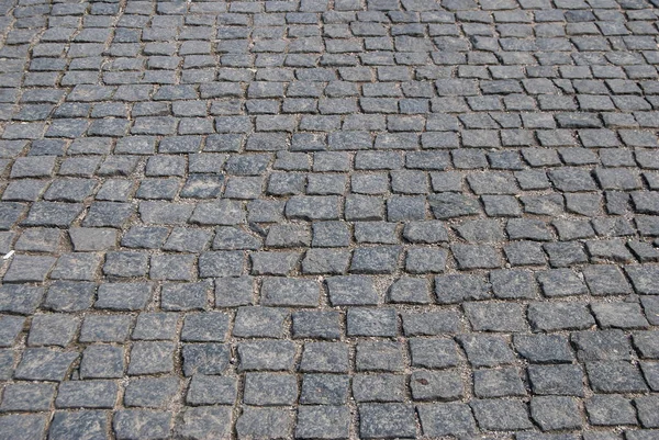 Abstrakt Bakgrund Gamla Kullersten Trottoar Närbild — Stockfoto