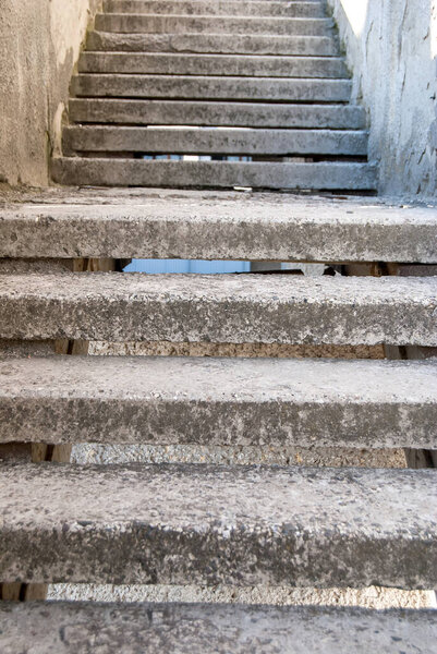 Stone and concrete staircase up