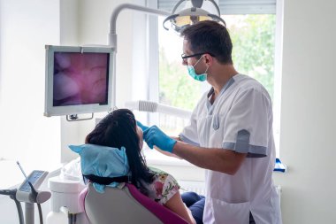Patient and doctor in dentistry, planned visit