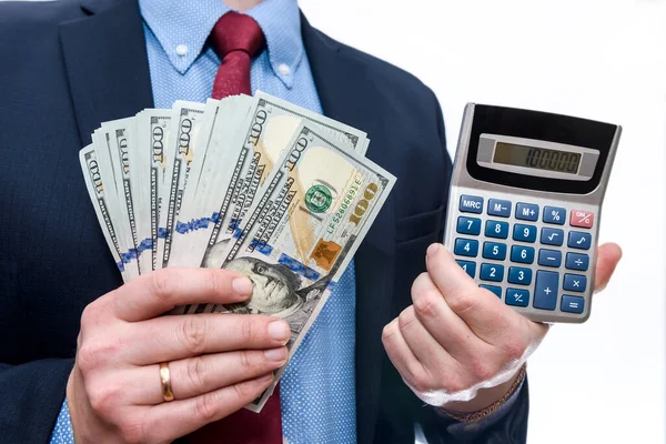 Biznesmen Trzyma Dolary Wentylatorze Kalkulatorze — Zdjęcie stockowe