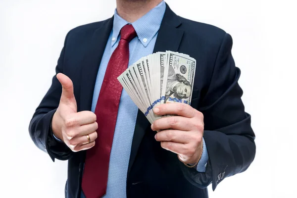 Takım Elbiseli Bir Adam Dolar Banknotları Tutuyor — Stok fotoğraf