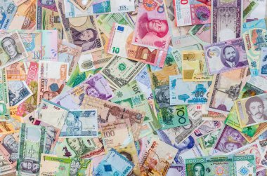 Tüm dünyada farklı banknotların, para birimlerinin karışımı.
