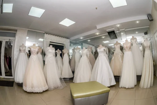 Beautiful wedding dresses in wedding atelier, fisheye effect