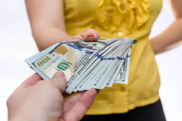 Kvinna Tar Dollar Högen Från Manlig Hand Närbild — Stockfoto