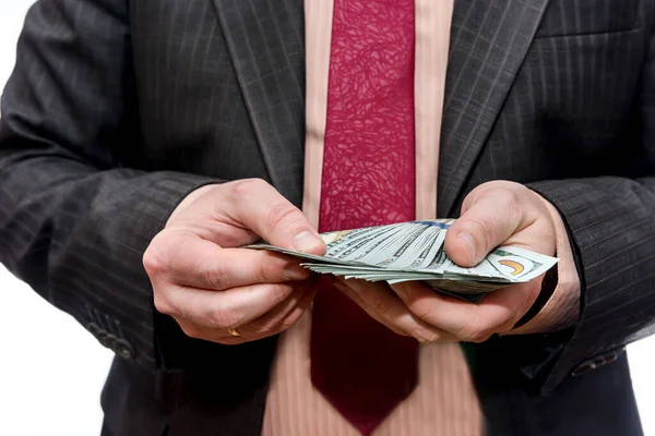 ホワイトで隔離されたドル紙幣を持つビジネスマン — ストック写真
