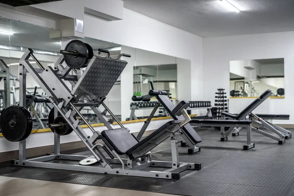 Modern and empty gym interior with equipment