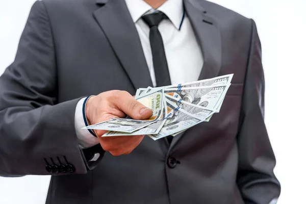 Dolar Banknotları Erkeklerin Elinde Yelpazede — Stok fotoğraf