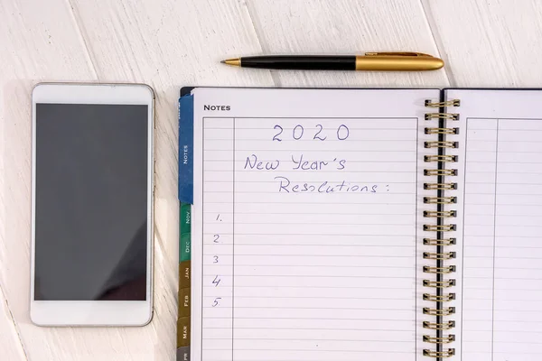 Notepad Phone Table New Year Resolution — Stock Photo, Image