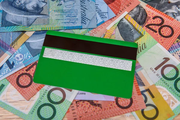 Credit card on australian dollar close up