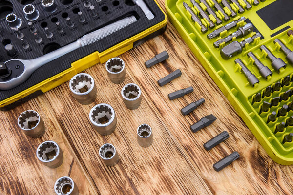 Mechanical tools on wooden table close up
