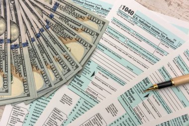 1040 vergi formu, para ve kalemle birlikte. vergi kavramı