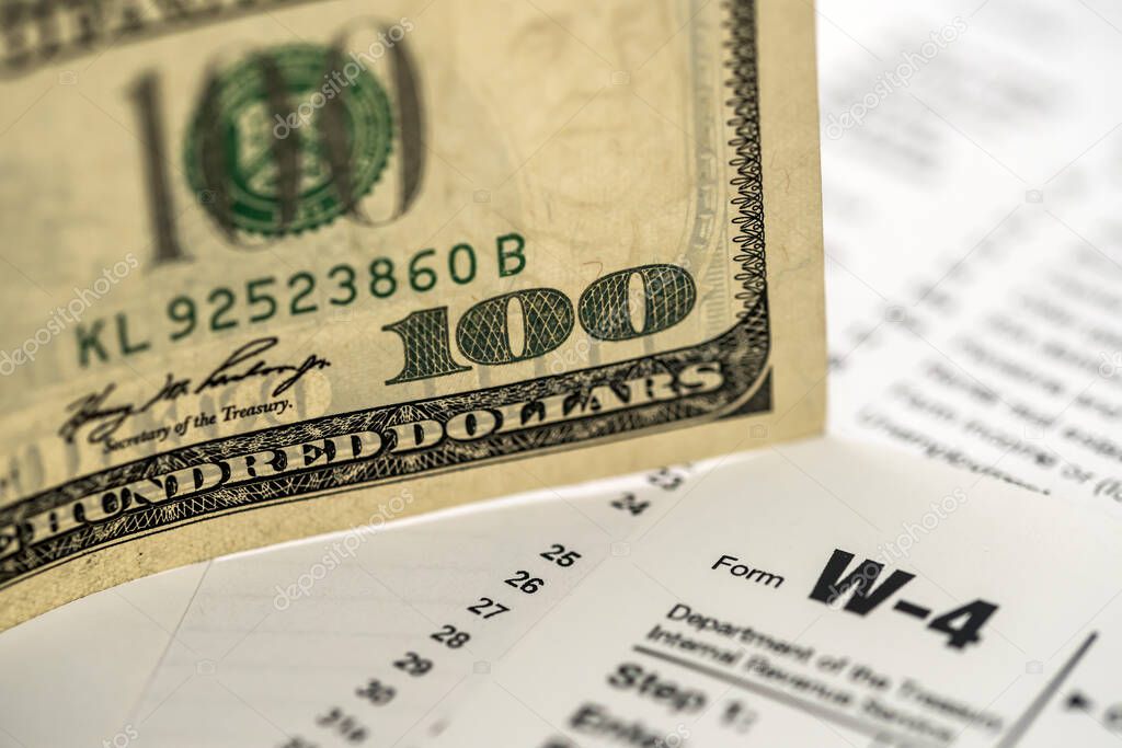 US tax form w4  w9 with money 