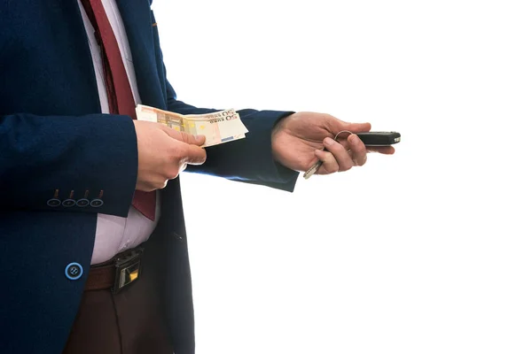 Бізнесмен Тримає Банкноти Євро Ключі Від Автомобілів Ізольовані Білому Тлі — стокове фото