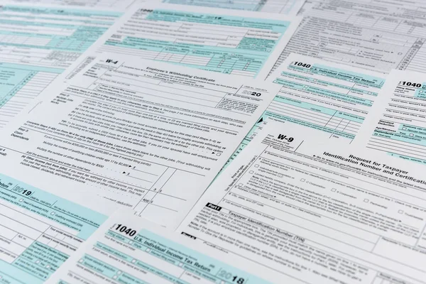 Many different usa tax form. w4 w9 and 1040 form for fill in april. Tax time